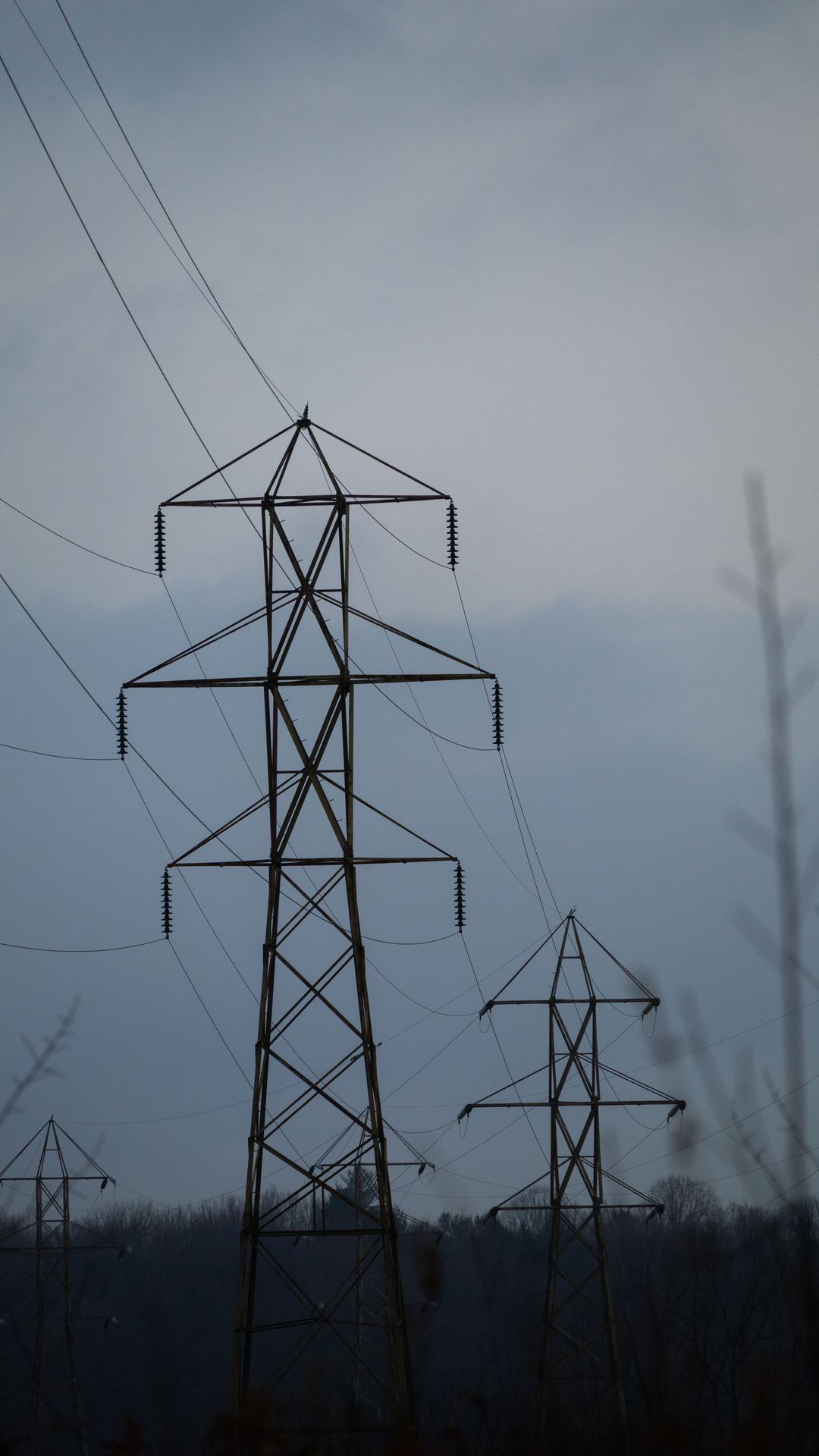 Heat and war damage strain Iran's power grid, July 2026; power transmission lines